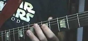 Play Darth Vader's theme on the guitar