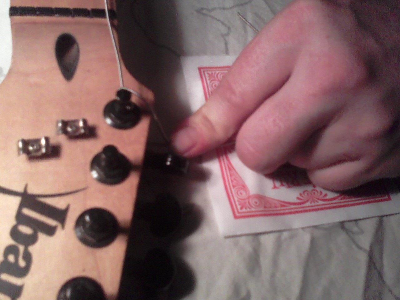 How to Restring & Tune an Electric Guitar