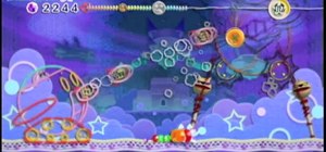 Beat the Yin Yarn boss fight in Kirby's Epic Yarn for the Nintendo Wii