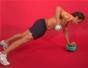 Exercise 1 arm dumbbell plank row on medicine ball