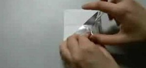 Fold a prize-winning origami SST paper airplane