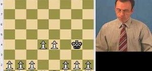 Play the lonely king chess puzzle by Sam Lloyd