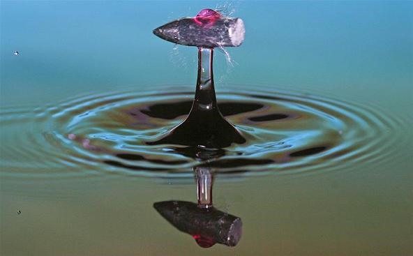 Speeding Bullet Vs. a Single Drop of Water