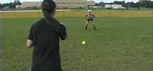 Train for softball with an outfield kneel down drill