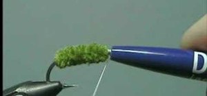 Use a half hitch to finish tying a fly fishing fly
