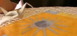Make a paper crane with origami
