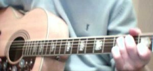 Play "Heroes" by David Bowie on acoustic guitar