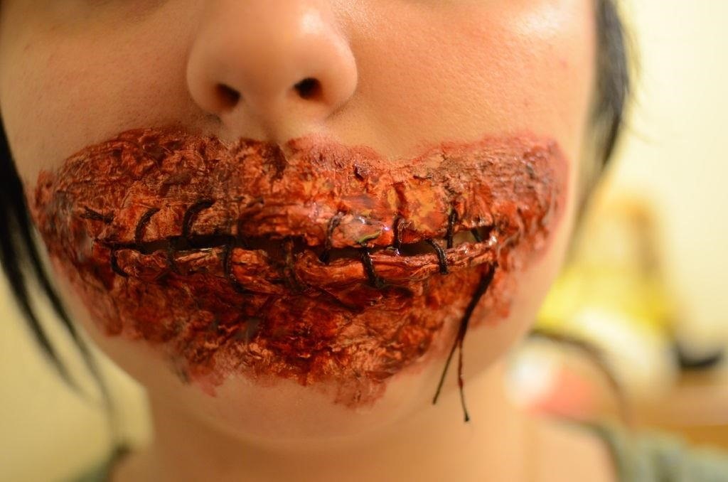Keep Your Mouth Shut: This DIY Sewn Lips Look for Halloween Is Bloody Gruesome