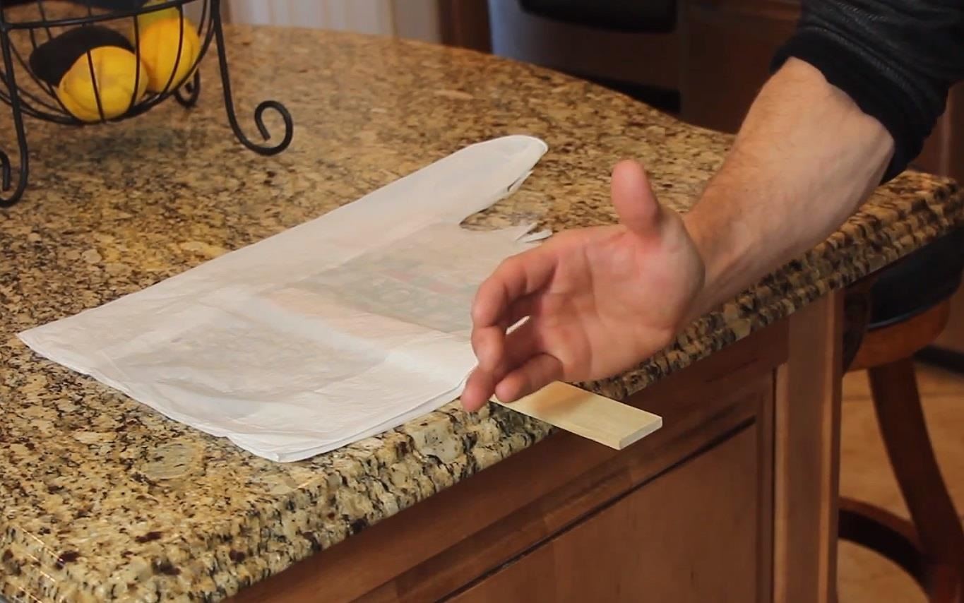How to Karate Chop a Paint Stick with Help from Air Pressure and a Plastic Bag
