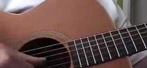 Fingerpick on the guitar