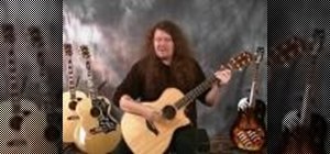 Learn palm muting on an acoustic guitar