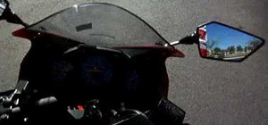 Shift gears on a 2008 Ninja 250 motorcycle