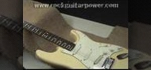 Adjust strong height / action on an electric guitar