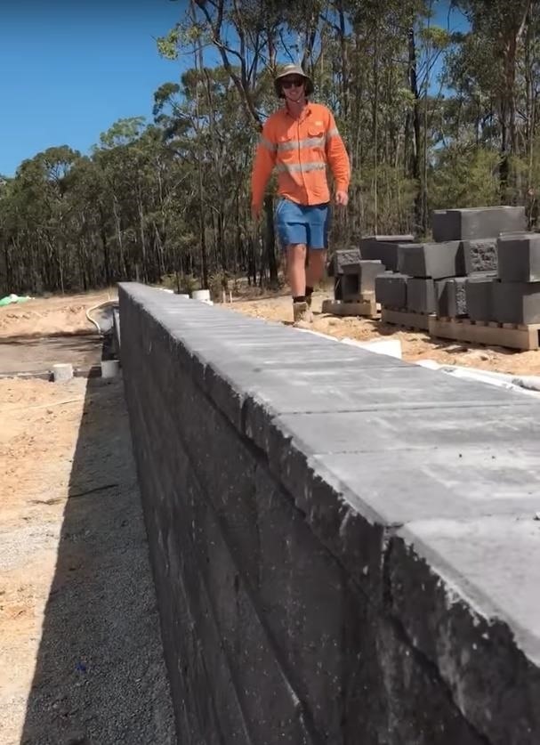Stone Workers Play Dominoes with Bricks to Create Perfectly-Aligned Wall Cap
