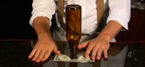 Win a free drink with this dollar under bottle bar trick