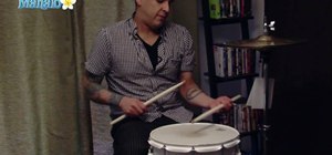 Hold a pair of drumsticks correctly