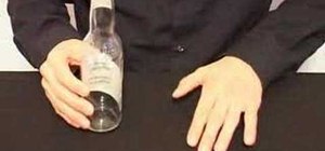 Perform the dime in a bottle bar trick