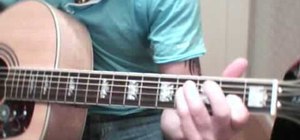 Play "She's Electric" by Oasis on guitar