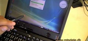 Install a SIM card for a 3G modem in a Lenovo ThinkPad X61 laptop