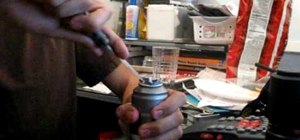 Make a stash can out of an Axe deodorant bottle