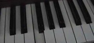 Play "Yesterday" by the Beatles on the piano
