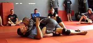 Perform Frank Mir's Superman technique from half guard