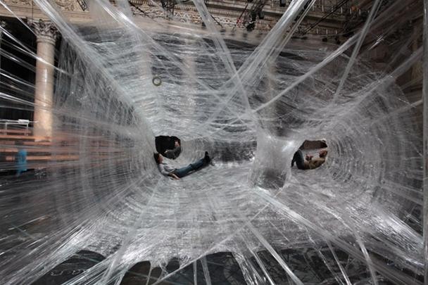 Massive Cocoons Trap Humans Like Flies in a Web