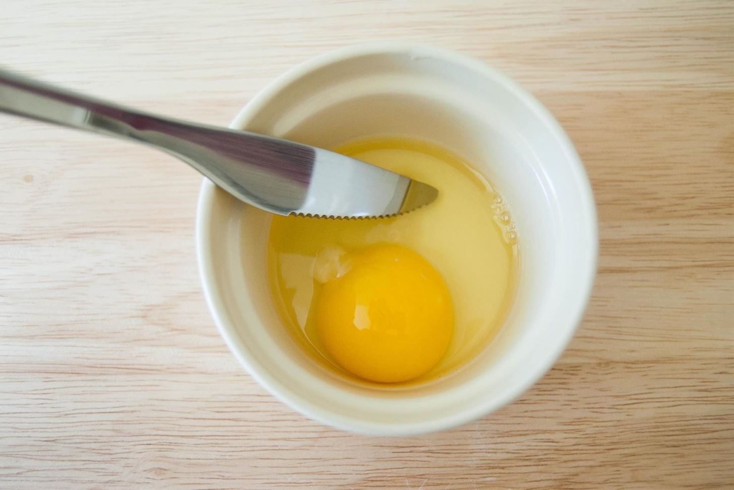 For Perfect Sunny-Side Up Eggs Every Time, Whisk Them (Seriously)