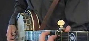 Play a quick melodic riff on the banjo