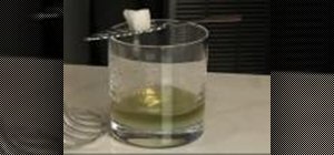 Prepare a traditional absinthe drink with a slow-drip fountain