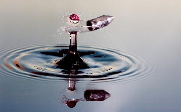 Speeding Bullet Vs. a Single Drop of Water