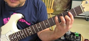 Play "Under the Bridge" by the Red Hot Chili Peppers on guitar
