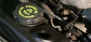 Replace the PCV valve and grommet in a Saturn S-Series