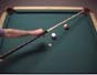 Make a straight-on draw shot in pool