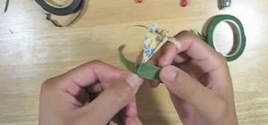 Make green stems and brown branches and add them to pre-folded origami flowers