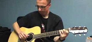 Play a finger picking pattern on the acoustic guitar